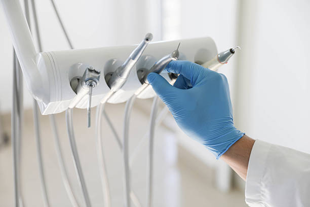 Professional Tooth Extraction technician working in Glenwood, IL